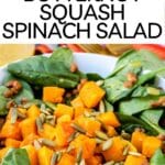 Bowl of salad with text overlay Butternut Squash Spinach Salad