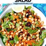 Bowl of salad with text overlay Vegan Chickpea Spinach Salad.
