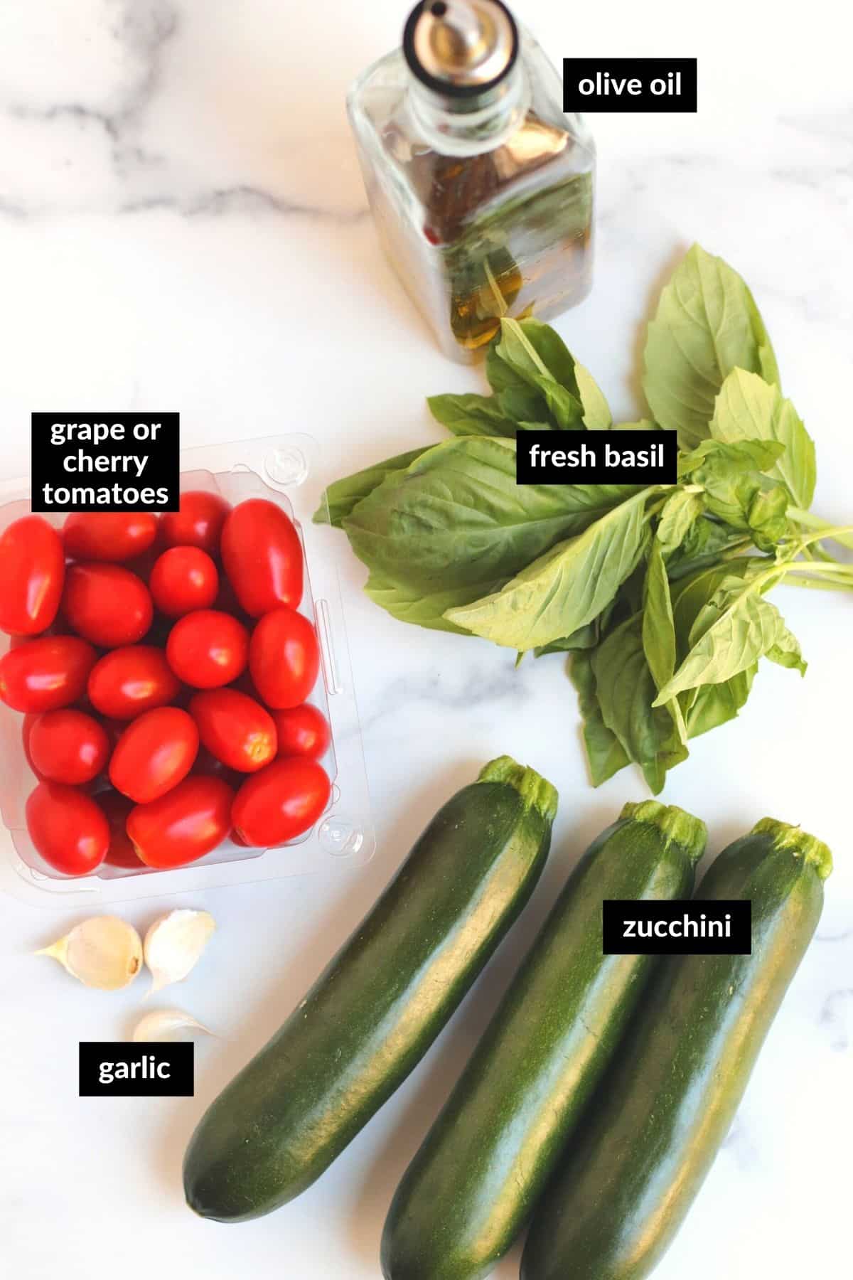 Image showing labeled ingredients for the recipe (olive oil, grape or cherry tomatoes, fresh basil, zucchini, and cloves of garlic)