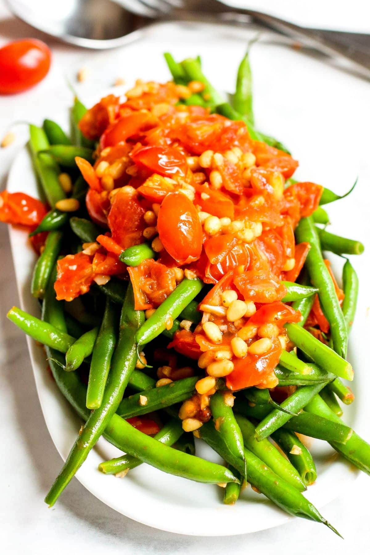 Close up of finished green beans recipe on a platter