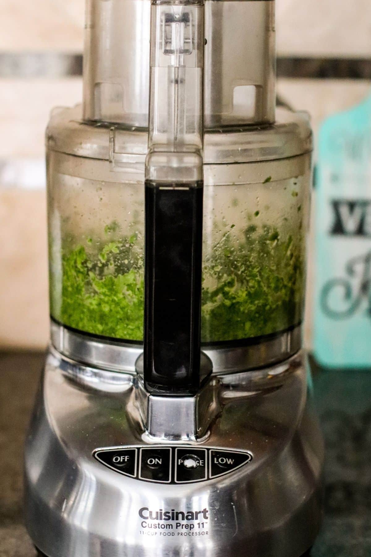 Making the cilantro sauce in a food processor