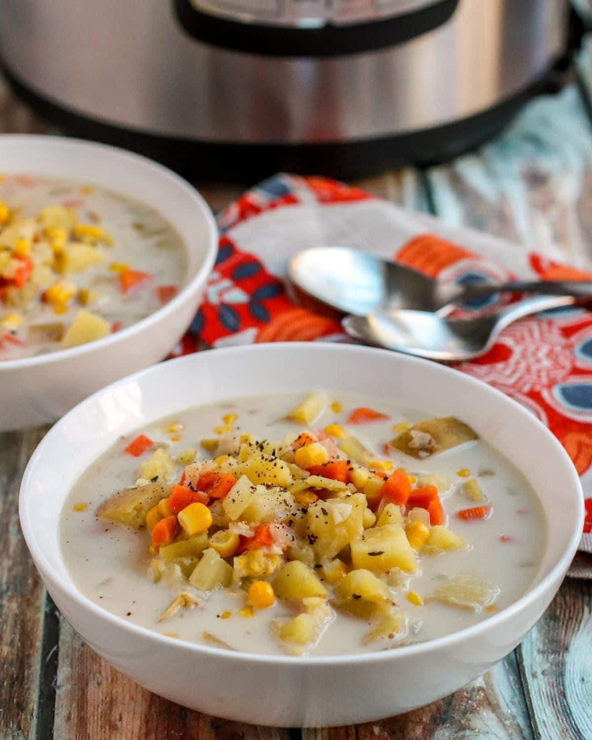 Bowls of chowder with Instant Pot in the background.