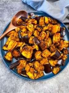 Platter of cooked cubes of eggplant