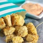 Popcorn tofu with dipping sauce in the background