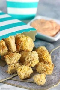 Popcorn tofu with dipping sauce in the background