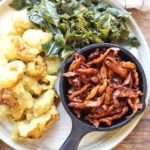 Plate with barbecue soy curls, potato salad, and collard greens