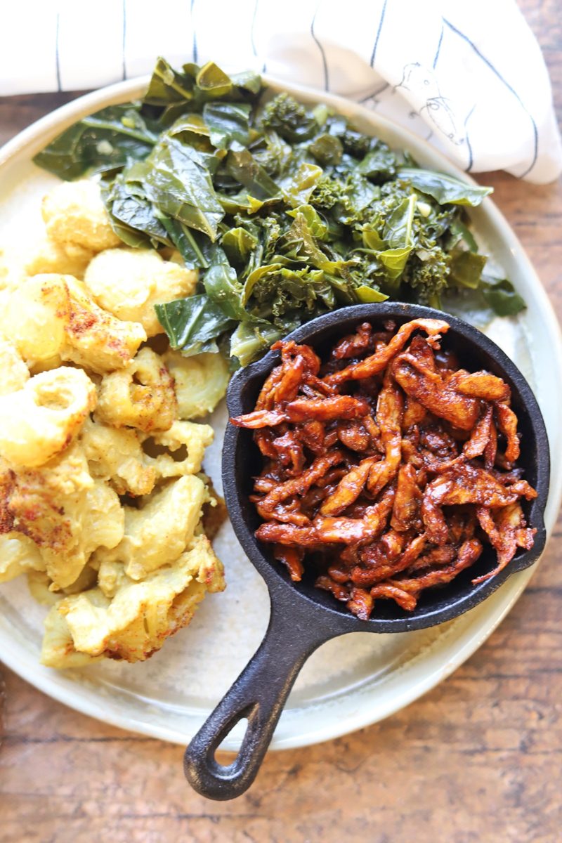 Plate with barbecue soy curls, potato salad, and collard greens