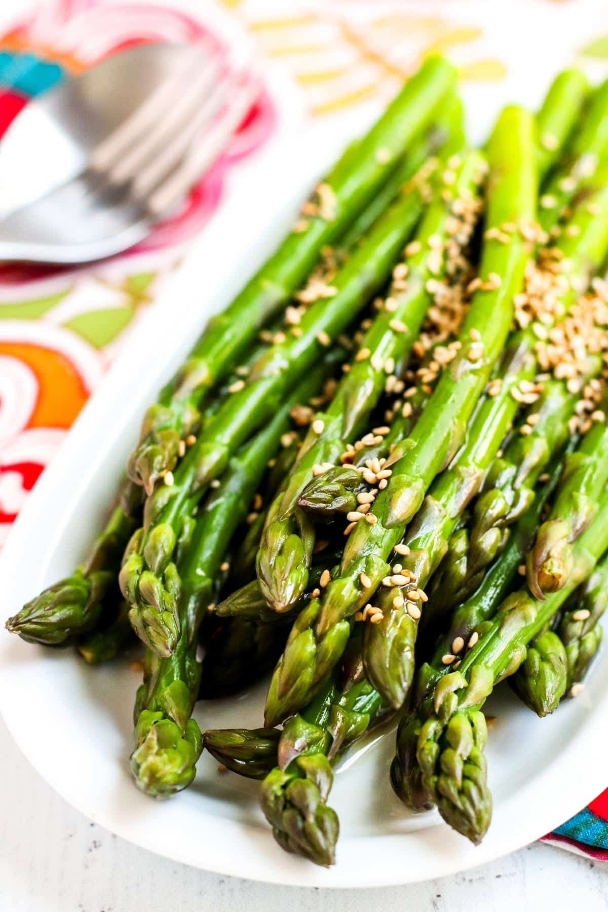 Close up of plate of sesame marinated asparagus.