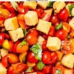 Salad with text overlay: Sourdough Panzanella Italian Bread and Tomato Salad.