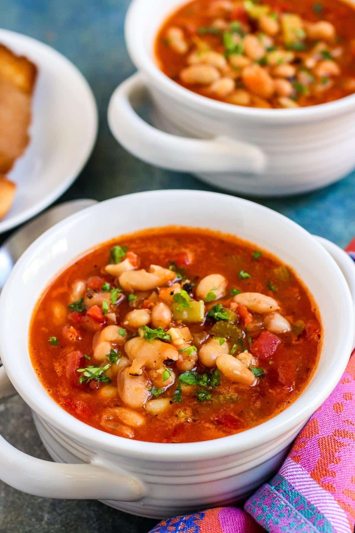 Chunky Tomato Soup in a white bowl with second bowl in the background.