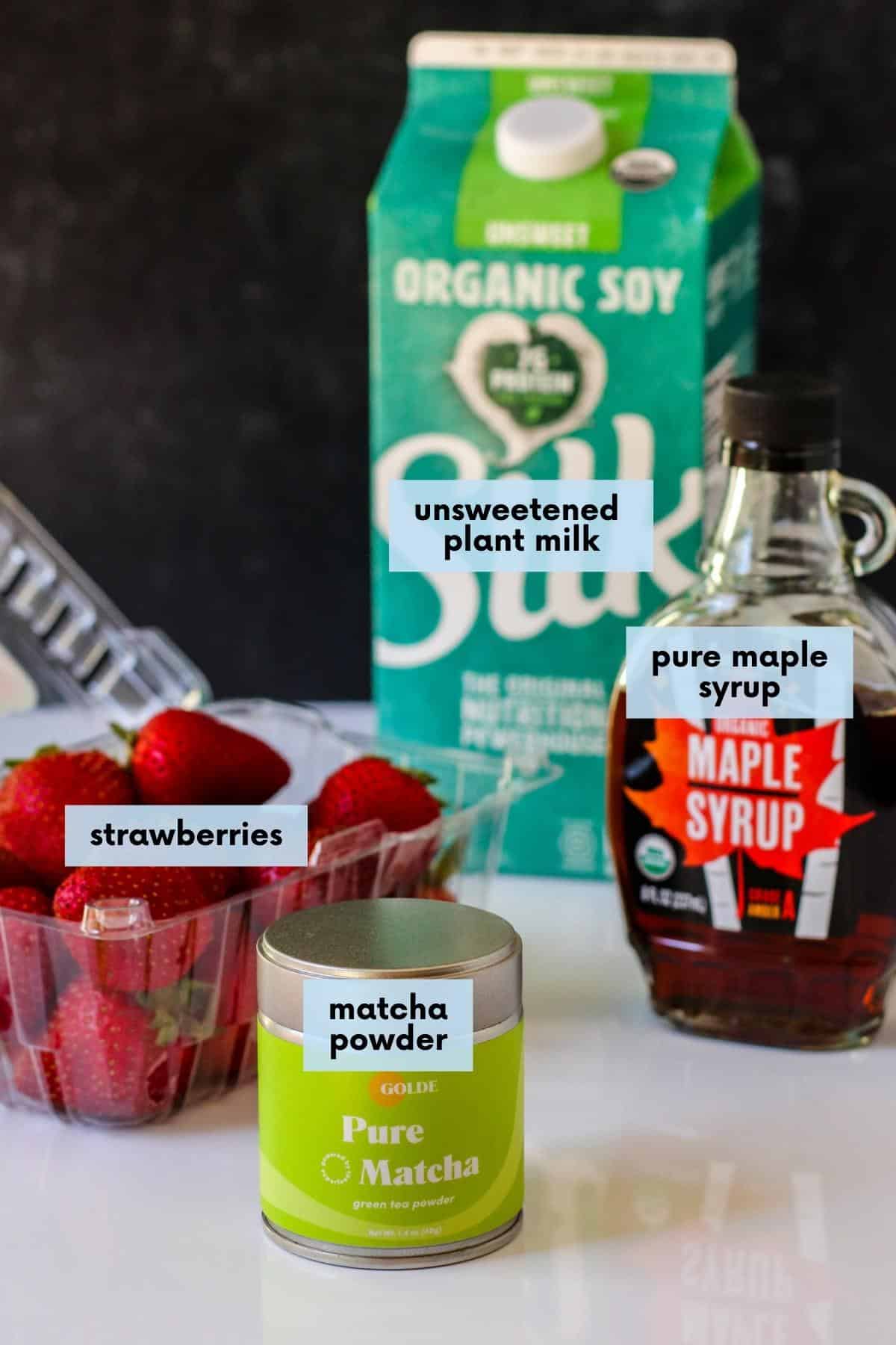 Labeled ingredients needed to make this recipe: Strawberries, non-dairy milk, pure maple syrup, and matcha powder.