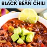 Bowls of chili garnished with lime and avocado with text overlay Easy Vegan Black Bean Chili.
