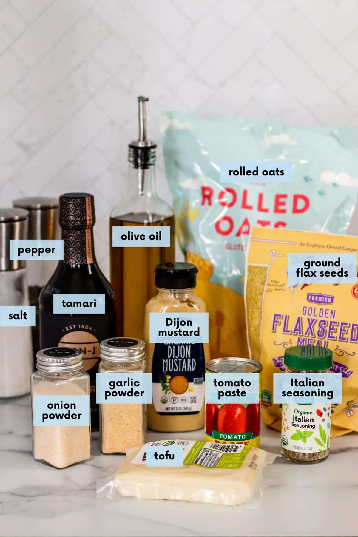 Ingredients with labels: Tofu, onion powder, garlic powder, tomato paste, Italian seasoning, Dijon mustard, ground flaxmeal, salt, pepper, tamari, olive oil, and rolled oats.