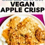 Serving of apple crisp on a plate with text overlay Small Batch Vegan Apple Crisp.