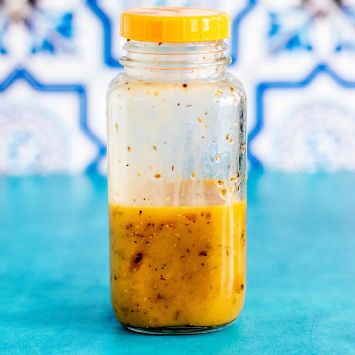 Jar of Vegan Greek Dressing.