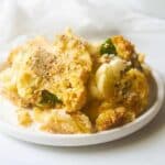 Serving of potato casserole on a plate.