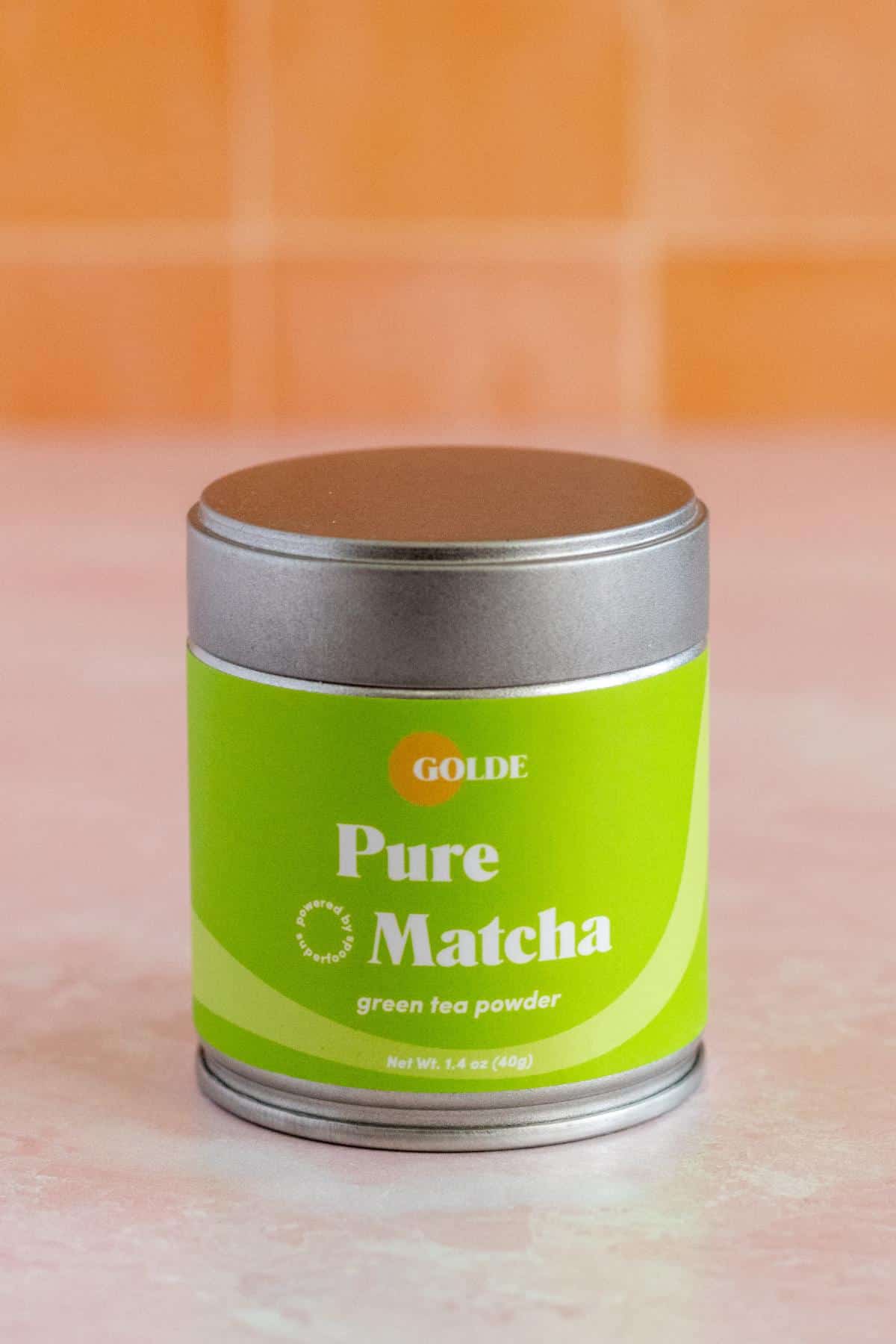 Tin of Golde Pure Matcha green tea powder.