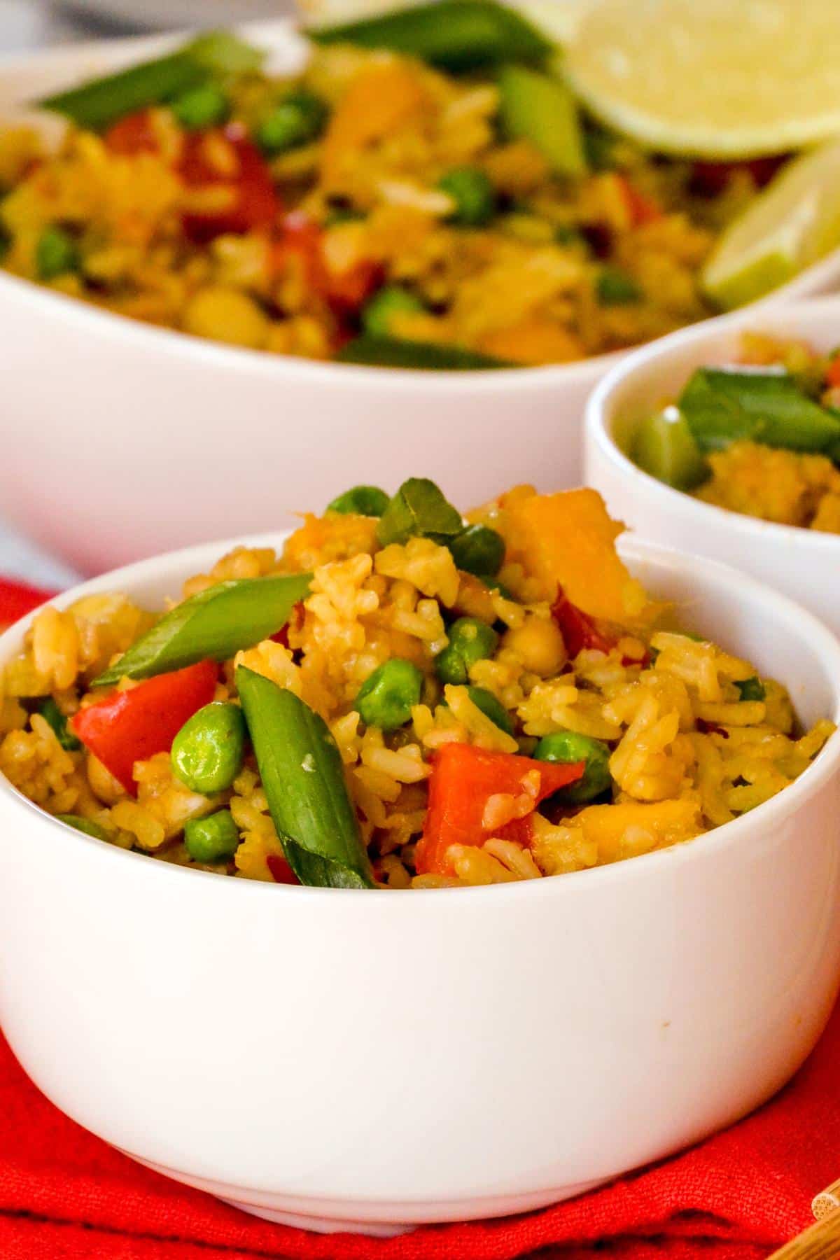 Individual serving of mango fried rice in a small bowl.