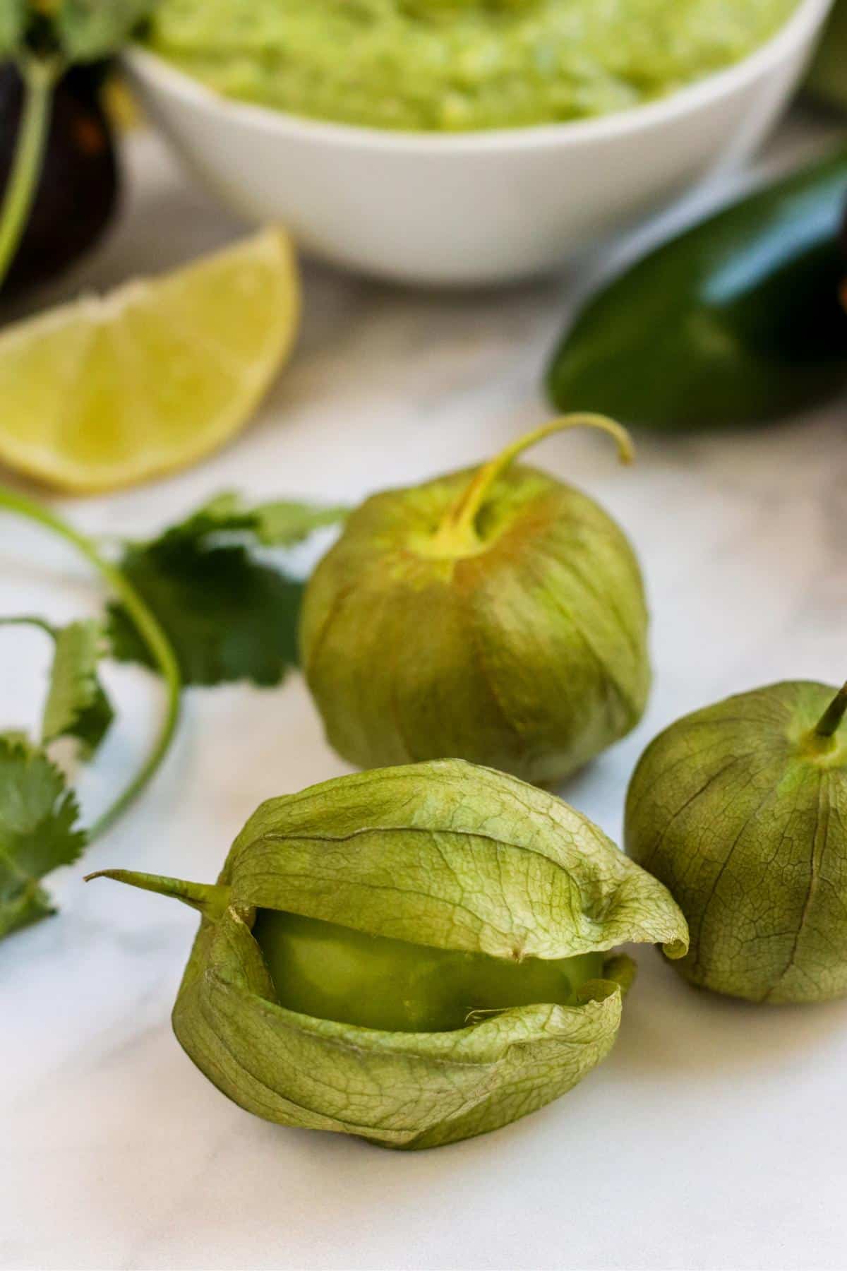 Tomatillos in their husks.