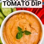 Bowl of dip with veggies and text overlay Creamy Vegan Sun-Dried Tomato Dip.