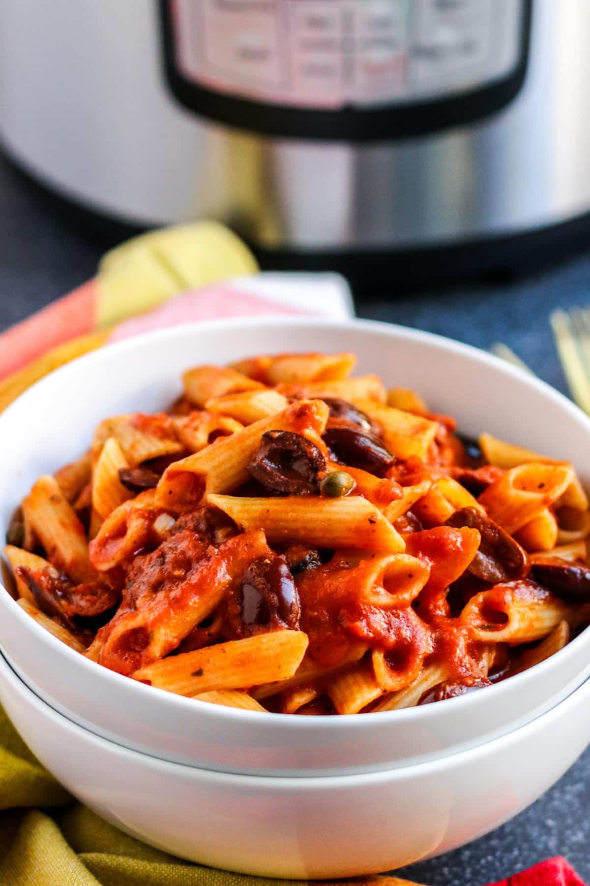 Bowl of Instant Pot Vegan Pasta Puttanesca.