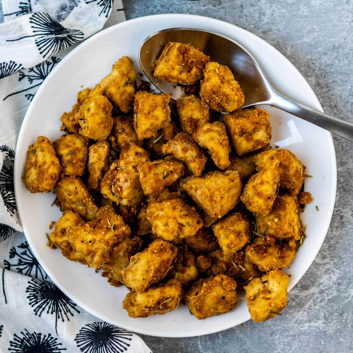 Plate of crispy tofu nuggets.