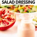 A bottle of pink vinaigrette, a cut open pomegranate, and a salad with text overlay: Blender Pomegranate Salad Dressing.
