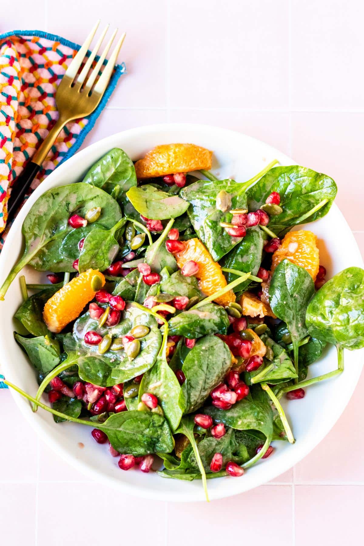 Spinach salad in a bowl.