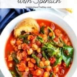 Bowl of tomato and chickpea stew with text overlay: Chickpea Tomato Stew with Spinach.
